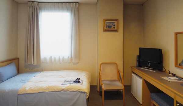 柔らかい色合いで心を落ち着かせる客室が、お仕事に疲れたお体を優しく癒してくれます。