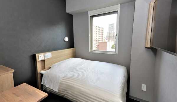 眠りを追及した150cm幅のワイドベッドと適度な硬さのマットでぐっすり