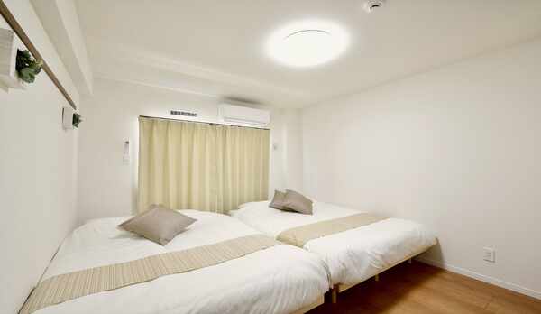 ゆったりくつろげるツインベッド