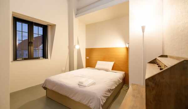 【デラックスダブル】ベッドは2名様でのご利用でも余裕のある大きさです。