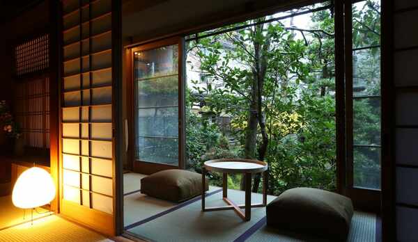 和洋室（庭園側・和室8畳＋ツインベッドルーム）の一例