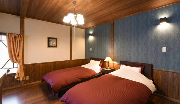 *【部屋】和洋室15畳トイレ付：ベッド