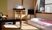 *【客室一例】男性専用和室6畳。お布団はご到着前に敷かせていただいております。