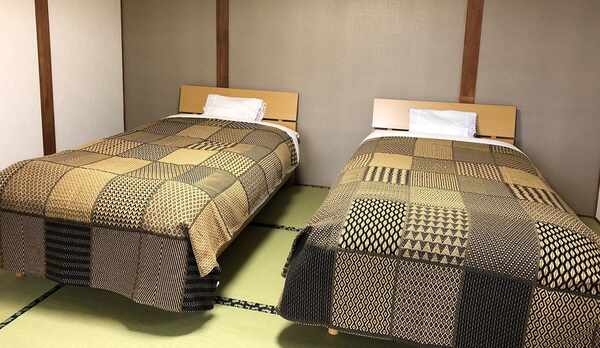 【客室一例】和室14畳。3人目以降は敷布団をご用意致します。