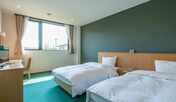 【スタンダードツインルーム】爽やかな緑の色合い、松島の自然をイメージしたお部屋