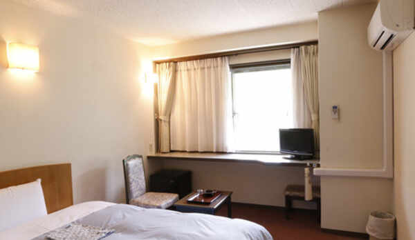 寛ぎ空間の洋室シングルルーム／例