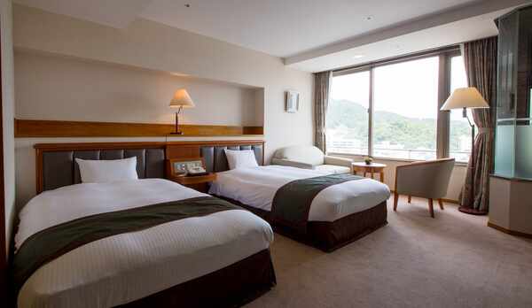 和洋室のセミダブルベッド