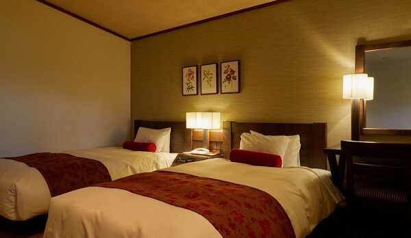 北欧の民家をイメージした落ち着いた雰囲気のベッドルーム