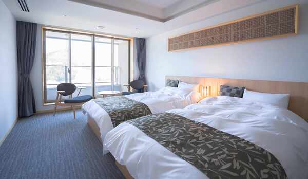 ・【デラックスツイン】ゆったりとした広さでワンランク大きい客室。モダンで落ち着きのある内装です。 