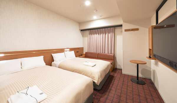 デラックスツイン【シモンズ社製セミダブルベッド（幅120㎝）ベッド2台】※バスルームとトイレが独立